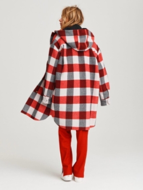 women in red black and white plaid coat